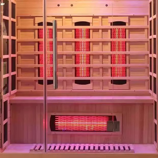Hybrid sauna illuminated at night